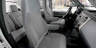 adjustment and reclining; includes driver s seat manual lumbar, integrated head restraints and fold-down armrest with tray and cupholders Air suspension with integral pump high-back bucket driver s