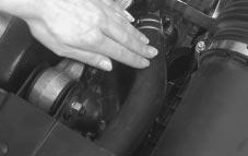 3. Then fill the coolant surge tank with the proper mixture, to the base of the filler neck. 4.