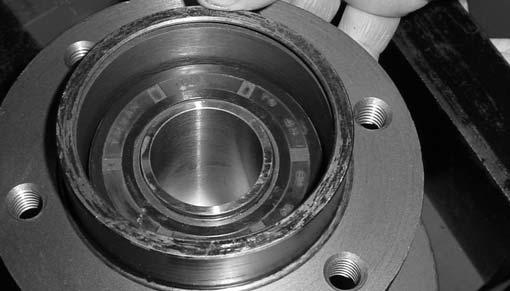 Press the bearing sleeve assembly (with face seal clean,