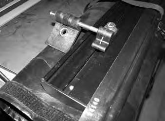 Repeat entire procedure for opposite side rail. 2. ASSEMBLING TENSION ADJUSTERS TO COVER Nut L Left XT Dial A. The cover comes pre-rolled to its normal open position for ease of installation.