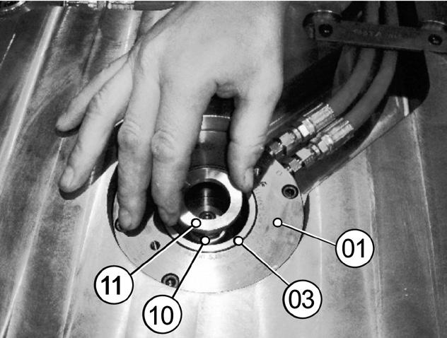 7) Install the actuator disk (11) over the actuator coupling (10) in the piston (03). Doc003181.