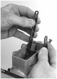 The tool can be leased from Stanadyne.] Save all the screws and the cover for later installation.