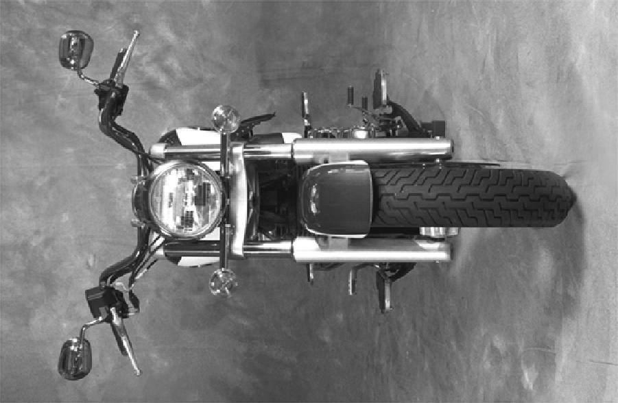 Front Suspension and Steering Check Front Forks 1. To check the front suspension, straddle the motorcycle and bring it to a vertical position. 2.