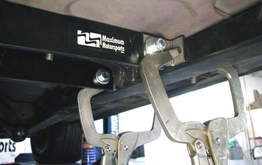 Bolt two Mounting Tabs to the rear arm of the TA Crossmember using the 3/8 x 1-3/4 with one 1/4 thick  15.