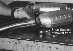 3. Remove the short section of tube remaining in the catalytic converter. 4. Grind the weld off of the tube so the tube can slide inside of the catalytic converter. converter. 11.