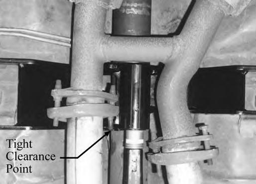 To make adjustments of the TA Crossmember, the exhaust must again be lowered. Then you can slide the TA Crossmember forward over the cross-over tube of the H-pipe.