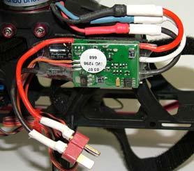 7. ESC INSTALLATION Mount the ESC (electronic speed controller) to the helicopter side frame with double sided tape.
