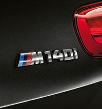The new BMW M140i Shadow Edition shown below in optional Black Sapphire metallic paintwork, LED headlights and rear lights with darkened surround, Black kidney grille frame and optional