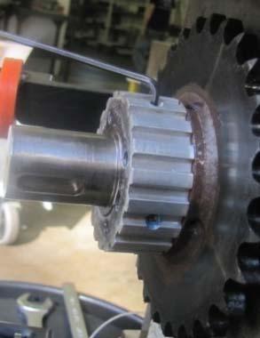 is visible between pulley and sprocket proceed to next