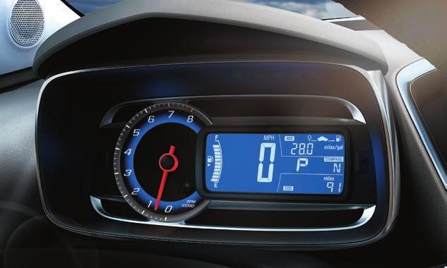 The motorcycle-inspired instrument cluster features an analog tachometer and digital speedometer.