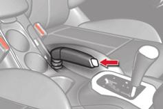 DRIVING MANUAL PARKING BRAKE Releasing Pull the parking brake lever up gently, press the release button then lower the lever fully.