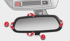 SITTING COMFORTABLY Door mirrors Rear view mirror Front seat belts Manual day/night model Adjustment A.