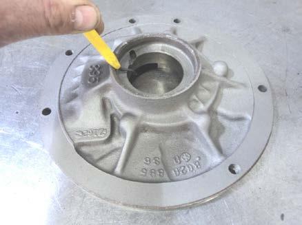Inspect the bushing bore for the presence of burrs raised during bushing removal.
