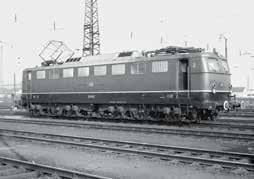Includes double lamps, multiple forced air vents, and a continuous rain gutter. Locomotive road number E 50 065. The locomotive looks as it did around 1962.
