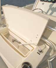 profile aluminum grab rails > Forward cuddy area featuring a freshwater electric head, 10-gallon holding > tank and overboard discharge (port) and enclosed lockable berth storage area for rods,