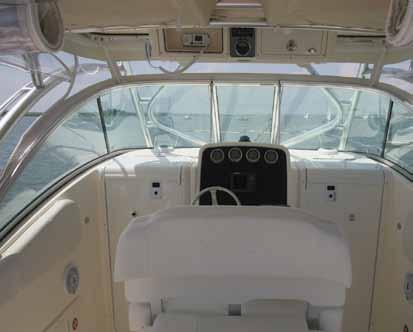 with 50-amp service and cordset > AC panel with digital meter and battery charger > 35-gallon freshwater system with water heater > Aluminum deck hatches with screens and shades > Fiberglass hardtop