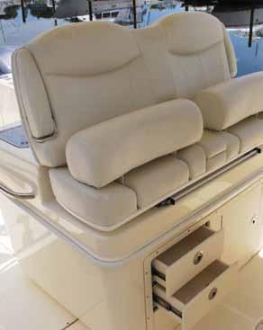 switches > Double-wide bucket seat with armrests forward of the console with integrated cup holders and storage > Insulated 185-quart molded-in console seat insulated box with overboard drain >