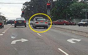 CG071 - General Knowledge You are turning right from one of two right turn only lanes. How should you use your indicators? - Indicate with your right hand signal the same as any other right hand turn.