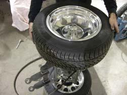 Install other wheel and tire on the axle.