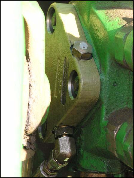 couplers from a John Deere dealer and install them on the ends of the AutoFarm pressure and return hoses.