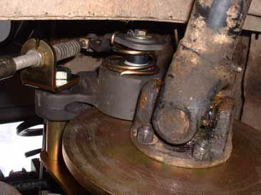 Re-fit the prop shaft at this point on order to clamp the brake disk in its final position. Connect the brake cable as shown in the photograph, but don t worry about adjustment at this stage.