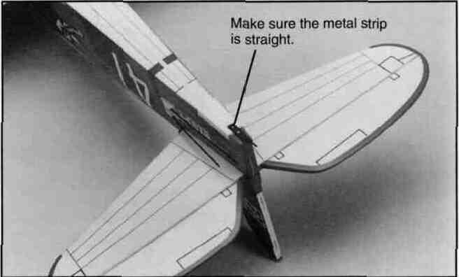 position the plastic stabilizer root cover over the fin Double check the positioning of the fin after doing