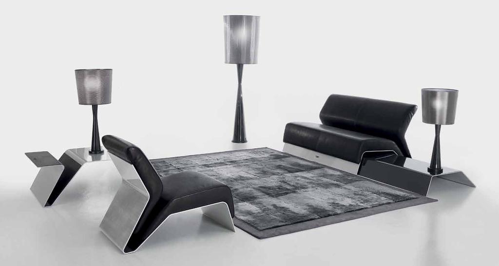 V015 floor lamp V015 lamp M V001 2 seat sofa V015 lamp M V005 table 1 side V002 long table RUG V001 armchair V001 2 seat sofa - 150x90xh78 cm - aluminium, carbon fibre, leather Skin col.