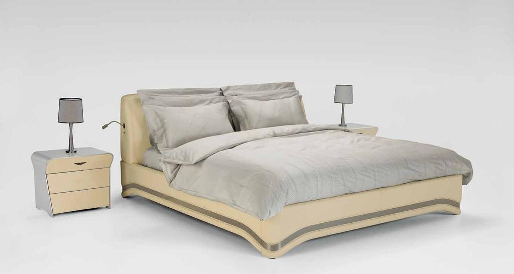 V035 king size bed V015 lamp V028 night table V035 king size bed - 210x232xh98 cm - wooden structure, alutex, leather Seta col.