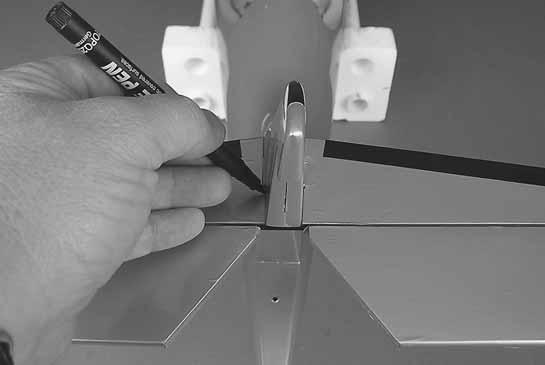 5. Place the stab into position on the back of the fuselage.