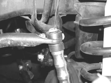 Locate the supplied ½ button head bolts and the sway bar bushing along with the cup washers. Attach the bushing end of the sway bar end links to the sway bar, leave loose at this time.
