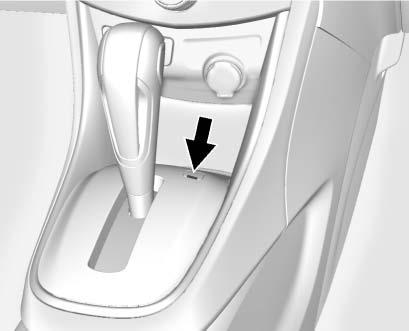 Driving and Operating 9-21 4. Insert and press the ignition key into the slot. 5. Move the shift lever out of P (Park).