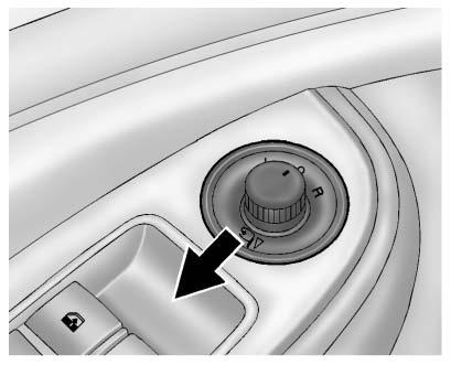 2-12 Keys, Doors, and Windows Power Mirrors To adjust the mirrors: 1. Turn the selector switch to L (Left) or R (Right) to choose the driver or passenger mirror. 2.