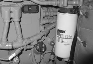 There is two shut off valves located on each side of the filter mount that can be closed to help reduce the amount of coolant lost during filter replacement. See Figure 17.