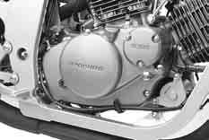 3-5 ENGINE Remove the oil cooler. Support the engine using an engine jack. Remove the engine mounting nuts and bolts.