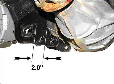 3) With an assistant s help, raise sub-frame 176588B up into the lower control arm frame brackets. See illustration 13.