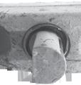 a bead of rubber protruding from the bushing, see Figure 6-12.