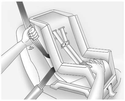 To tighten the belt, push down on the child restraint, pull the shoulder portion of the belt to tighten the lap portion of the belt, and feed