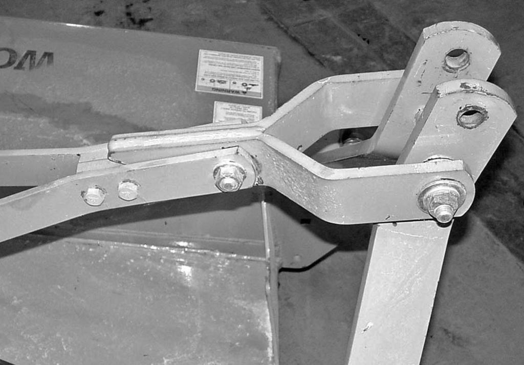 Disassemble Shipping Unit Refer to Figure 29. 1. Position cutter flat and place a block underneath the rear of the cutter to raise it off the ground. 2. Remove all parts that are wired or strapped to cutter.