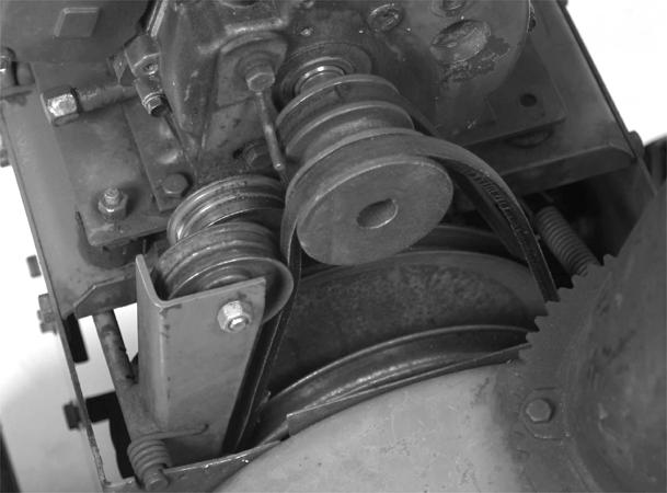 Auger Gearbox Service 9. The auger flighting is attached to the auger shaft with one bolt and locknut. Reach through the holes in the drum augers to access.