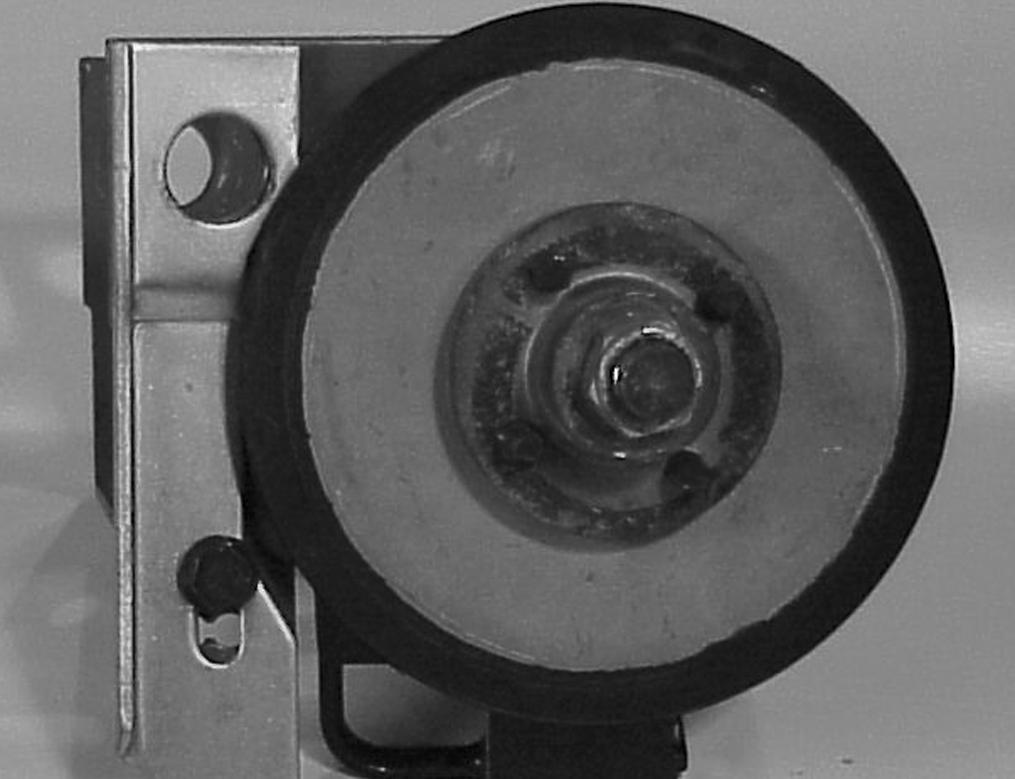 bracket. Install the locknut, holding the hex shaft with an openend wrench (Figure 04).