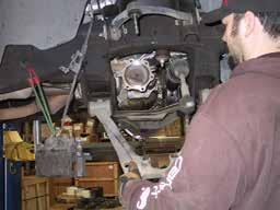 Uninstall the driveshaft from the differential. Unbolt the rear crossmember (this is the crossmember that the a-arms hook to). 2.