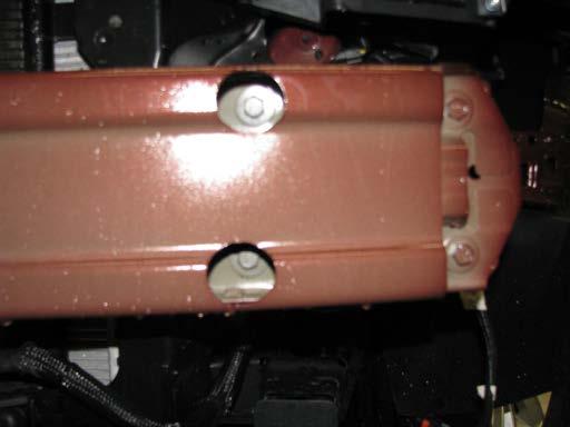 7. Using the 13MM socket, remove four metric bolts from the bumper, two on each side. Set the bolts aside to be reinstalled later. 7 8.