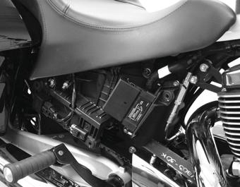 Maintenance Rear Suspension Adjustment 1. Park the motorcycle with the sidestand down on a firm, level surface. Remove all riders and cargo. Air Fitting 2. Remove the right side cover.