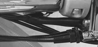 Repeat the twist and release process with the handlebars turned fully right and fully left. NOTICE: To prevent damage to the throttle system, always operate with the throttle cable guard installed. 3.