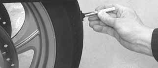 Inspect for debris adhering to the end of the wheel speed sensors.
