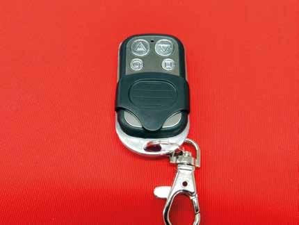 Rollerdor RD55 Econ Roller Garage Door 5. PROGRAMMING REMOTE CONTROL HANDSETS (HOLD TO RUN) 1 Slide the black cover down on the remote control handset and you will see there are four buttons (fig 5.