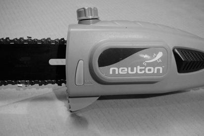 3. Install the Charged Battery Pack in your NEUTON Pole Saw by aligning the connector on the Battery Pack with the receptacle at the rear of the Saw and insert the Battery Pack (Figure 7) until the