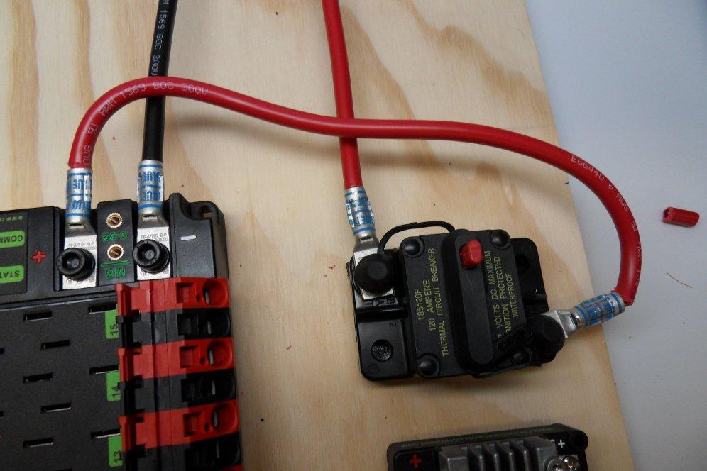 Wire Breaker to PDP Requires: 6AWG red wire, 2x 6AWG terminal lugs, 5mm Allen, 7/16" box end Secure one terminal lug to the end of the 6AWG red wire.