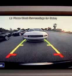 For non-navigation vehicles, the image will appear in the rearview mirror.