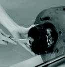 6. Use the appropriate bearing puller (Tool ID T6) or two prybars to remove the lower front bearing from its bore.